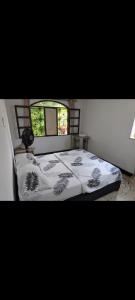 Ένα ή περισσότερα κρεβάτια σε δωμάτιο στο Central Point Air BAQ