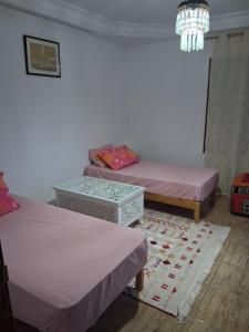 Postel nebo postele na pokoji v ubytování Antonie