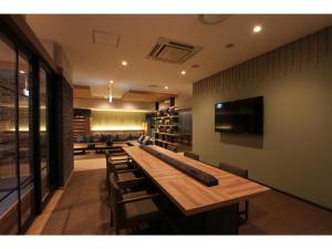 Et tv og/eller underholdning på KAJIMACHI NO YU SPA SOLANI - Vacation STAY 26781v + 18 billeder