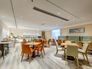 Restaurace v ubytování City Comfort Inn Tangshan Railway Station Lunan District Government