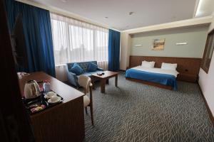 Postel nebo postele na pokoji v ubytování Innab Inn Hotel + 22 fotografií