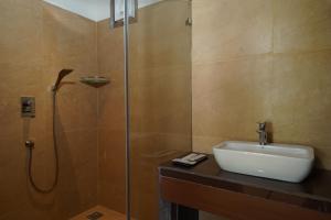 Et badeværelse på Trishvam Palolem Beach Resort