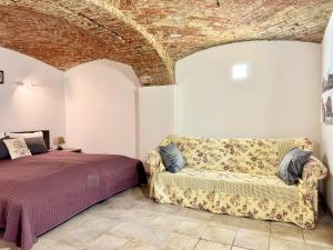 Un pat sau paturi într-o cameră la Vila Kralj