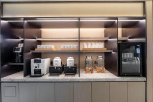 Η κουζίνα ή μικρή κουζίνα στο JI Hotel Shanghai Songjiang Wanda