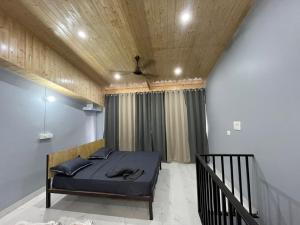 Giường trong phòng chung tại Rooms & Rooms