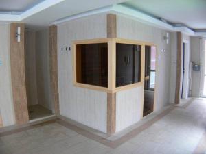 A television and/or entertainment centre at Family Wellness Apartman