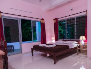 Orchid Lake View Homestay客房内的一张或多张床位