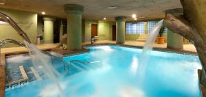 The swimming pool at or close to Senator Granada
