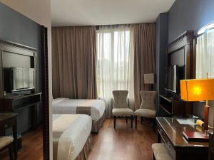 TV a/nebo společenská místnost v ubytování Kingston Hotel 18 - Kuala Lumpur Sri Damansara