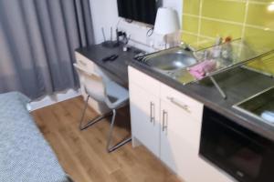 Kuchyň nebo kuchyňský kout v ubytování Central Liverpool 1-Bed Apartment City Centre