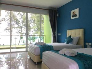 Кровать или кровати в номере Greenseaview Resort +112 фотографий