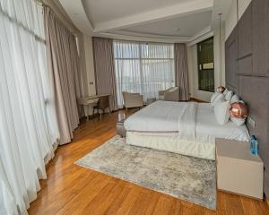 Postel nebo postele na pokoji v ubytování The Curve by the Park Nairobi by TSG + 89 fotografií