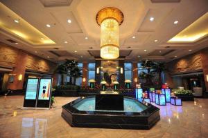 Vstupní hala nebo recepce v ubytování Dongying Blue Horizon Intenational Hotel