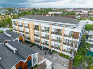 an overhead view of a building with a pool at Sunny Aparts 1 by Betterplace in Canggu +25 photos
