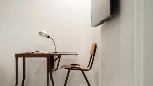 Una televisión o centro de entretenimiento en Gyeongju Hwangnaminn Pension