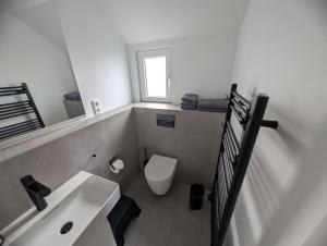 Phòng tắm tại Dünen Lodge 6 +7 ảnh