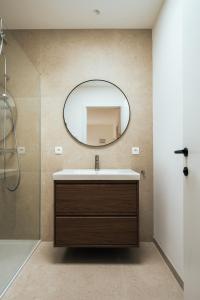 a bathroom with a sink and a mirror at Bocca in Hasselt +18 photos