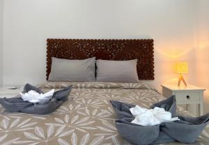 En eller flere senge i et værelse på Tropical 3BR Private Pool Jungle Home Villa + 29 billeder