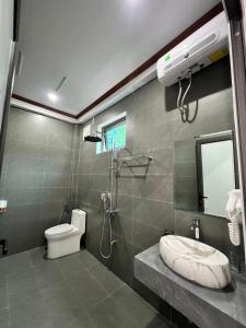 Et badeværelse på Tam Coc Mountain Light Homestay + 59 billeder