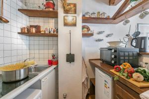 Køkken eller tekøkken på Appartamento Aricami - Happy Rentals
