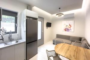 Kuchyň nebo kuchyňský kout v ubytování Villa Redi Relaxing Spa