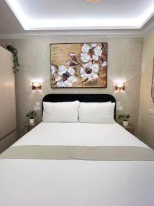 Postel nebo postele na pokoji v ubytování Rosalina Residences