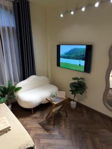 TV/trung tâm giải trí tại Looking homestay