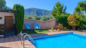 Nespecifikovaný výhled na hory nebo výhled na hory při pohledu z prázdninového domu