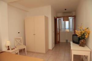 Postel nebo postele na pokoji v ubytování Hotel Amarea - Aeolian Charme