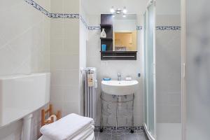 Koupelna v ubytování Appartamento Rifugio dei Sogni - Happy Rentals + 14 fotografií