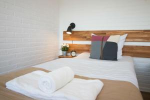 Voodi või voodid majutusasutuse Hotel Lisboa toas