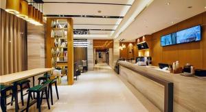 Μια τηλεόραση ή/και κέντρο ψυχαγωγίας στο City Comfort Inn Hotel Nanning Nanhu Park Macun Metro Station