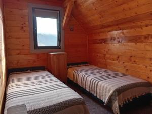 Postel nebo postele na pokoji v ubytování Independent Chalet + 7 fotografií