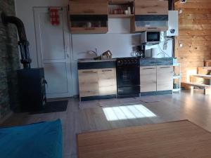 Kuchyň nebo kuchyňský kout v ubytování Independent Chalet