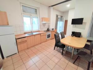 Kuchyň nebo kuchyňský kout v ubytování Apartment Haus