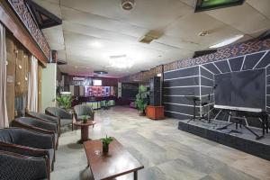 TV a/nebo společenská místnost v ubytování Sahid Kawanua Hotel