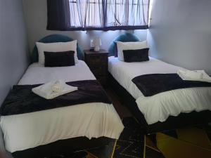 En eller flere senge i et værelse på WegkruiperQ 2