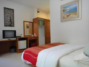 Ένα ή περισσότερα κρεβάτια σε δωμάτιο στο Rai Sai Luang Resort +133 φωτογραφίες