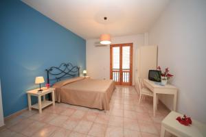 Postel nebo postele na pokoji v ubytování Hotel Amarea - Aeolian Charme