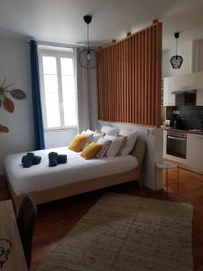 Postel nebo postele na pokoji v ubytování Magnifique appartement de standing climatisé lumineux