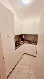 Køkken eller tekøkken på Villa Angiolina