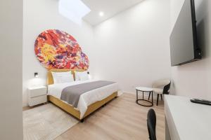 TV a/nebo společenská místnost v ubytování Hotel Eleven