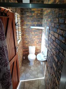 Et badeværelse på Malkop Sea View Resort