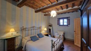 Un ou plusieurs lits dans un hébergement de l'établissement Conca d'Oro