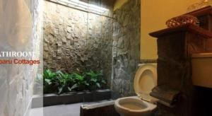 Ένα μπάνιο στο Kalibaru Cottages +30 φωτογραφίες