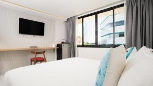 Μια τηλεόραση ή/και κέντρο ψυχαγωγίας στο Laoteng Boutique Hotel