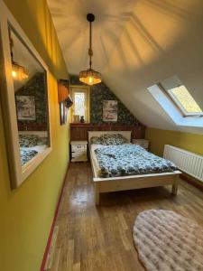 Postel nebo postele na pokoji v ubytování Willa pod Leskowcem - agroturystyka - pokoje pod wynajem