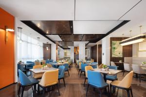 Posezení v ubytování 武汉国际广场江汉路希尔顿欢朋酒店