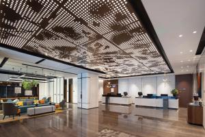 Posezení v ubytování 武汉国际广场江汉路希尔顿欢朋酒店