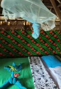 a box filled with green and red candy at Yasur Backpackers Bungalow & Tree House in Tanna Island